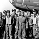 The crew of Memphis Belle prior to their final mission (L to R): Harold P. Loch; Cecil H. Scott; Robert Hanson; James Verinis; Robert K. Morgan; Charles B. Leighton; John P. Quinlan; Casimer A “Tony” Nastal; Vincent Evans; Clarence E. “Bill” Winchell. Note the mission markings on the aircraft. Each bomb represents a mission, and the star above indicates mission leader. The swastikas denote victories over German fighters. (US Air Force)
